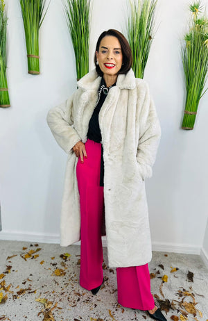 long faux fur coat in beige