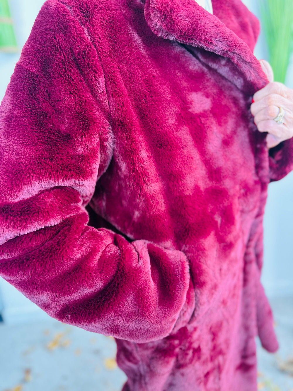 long faux fur coat in mulberry