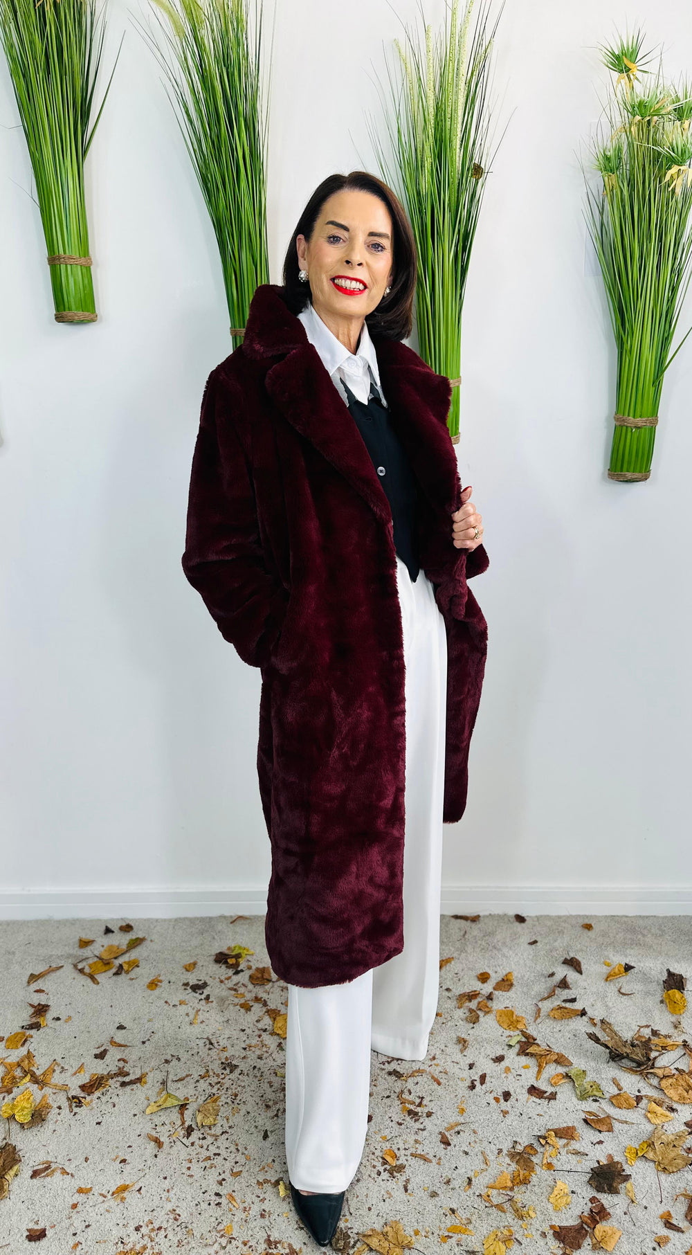 long faux fur coat in mulberry