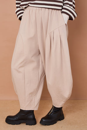 Della cocoon trousers in stone scuba fabric