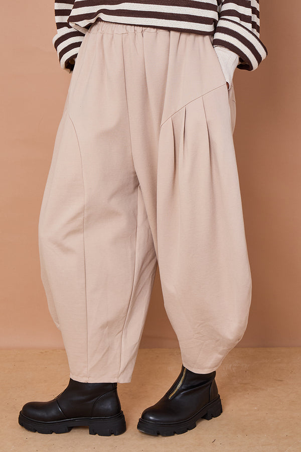 Della cocoon trousers in stone scuba fabric