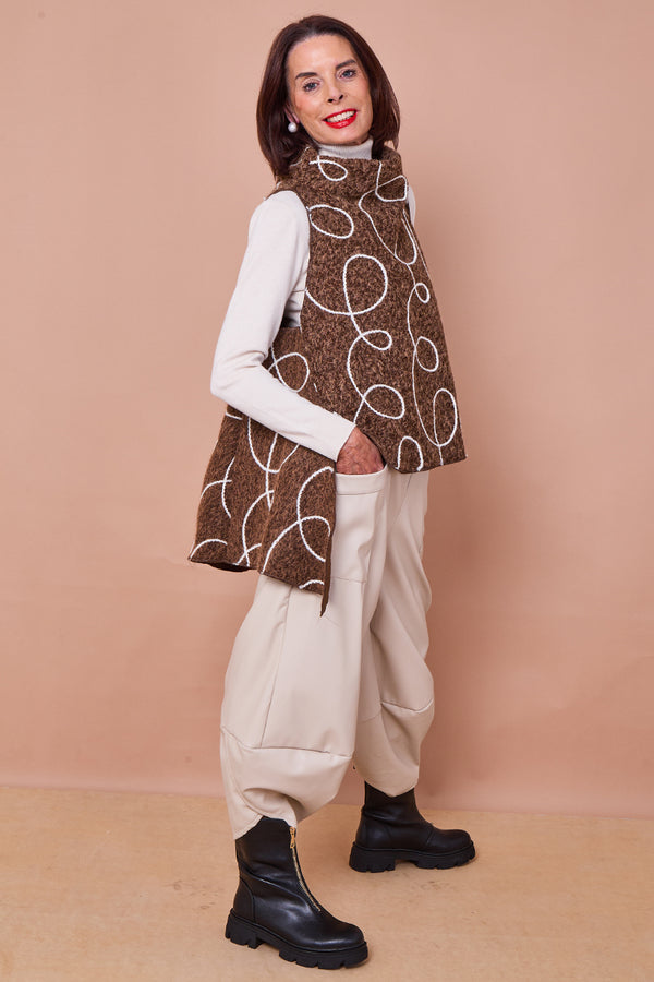 Pinocchio trousers in beige faux pu leather