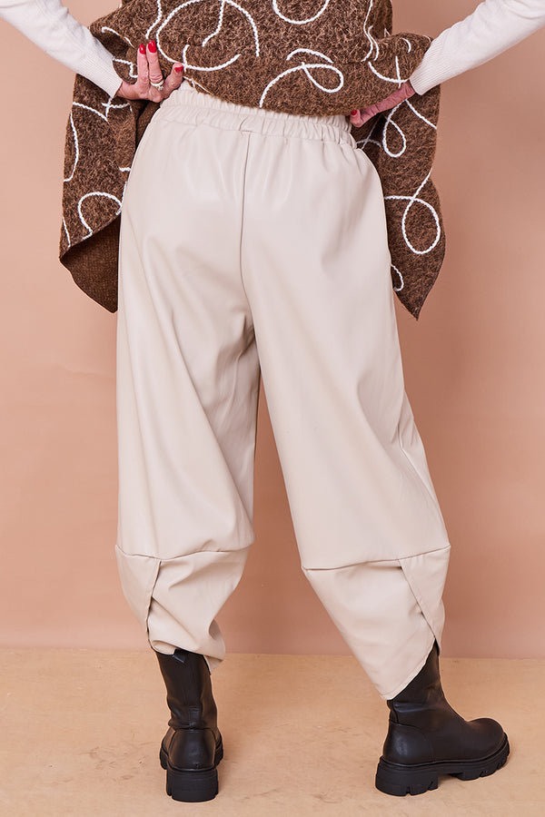 Pinocchio trousers in beige faux pu leather