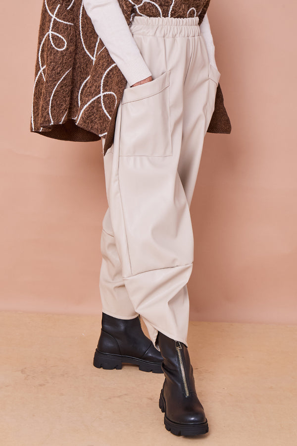 Pinocchio trousers in beige faux pu leather