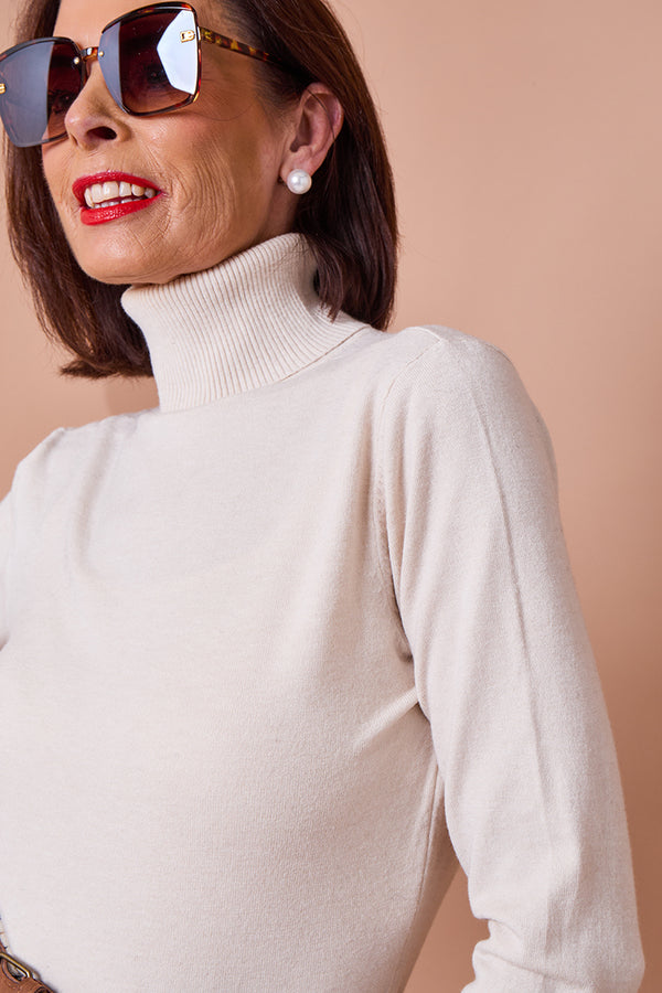 Patchouli roll neck top in cream