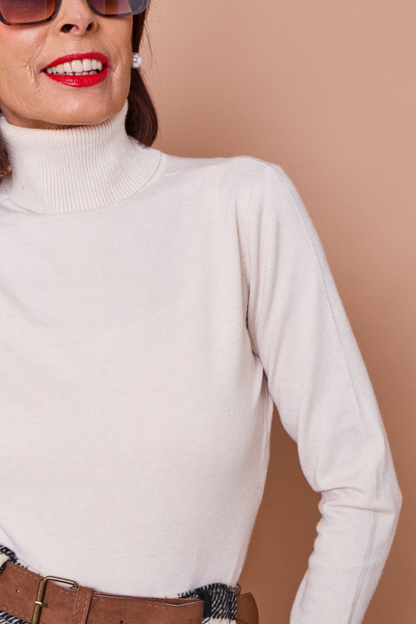 Patchouli roll neck top in cream