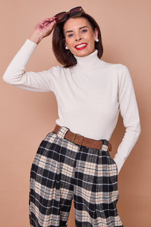 Patchouli roll neck top in cream