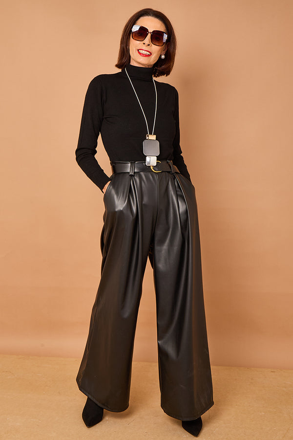 Patchouli roll neck top in black