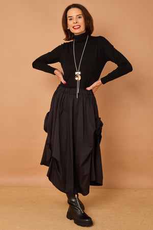 Patchouli roll neck top in black