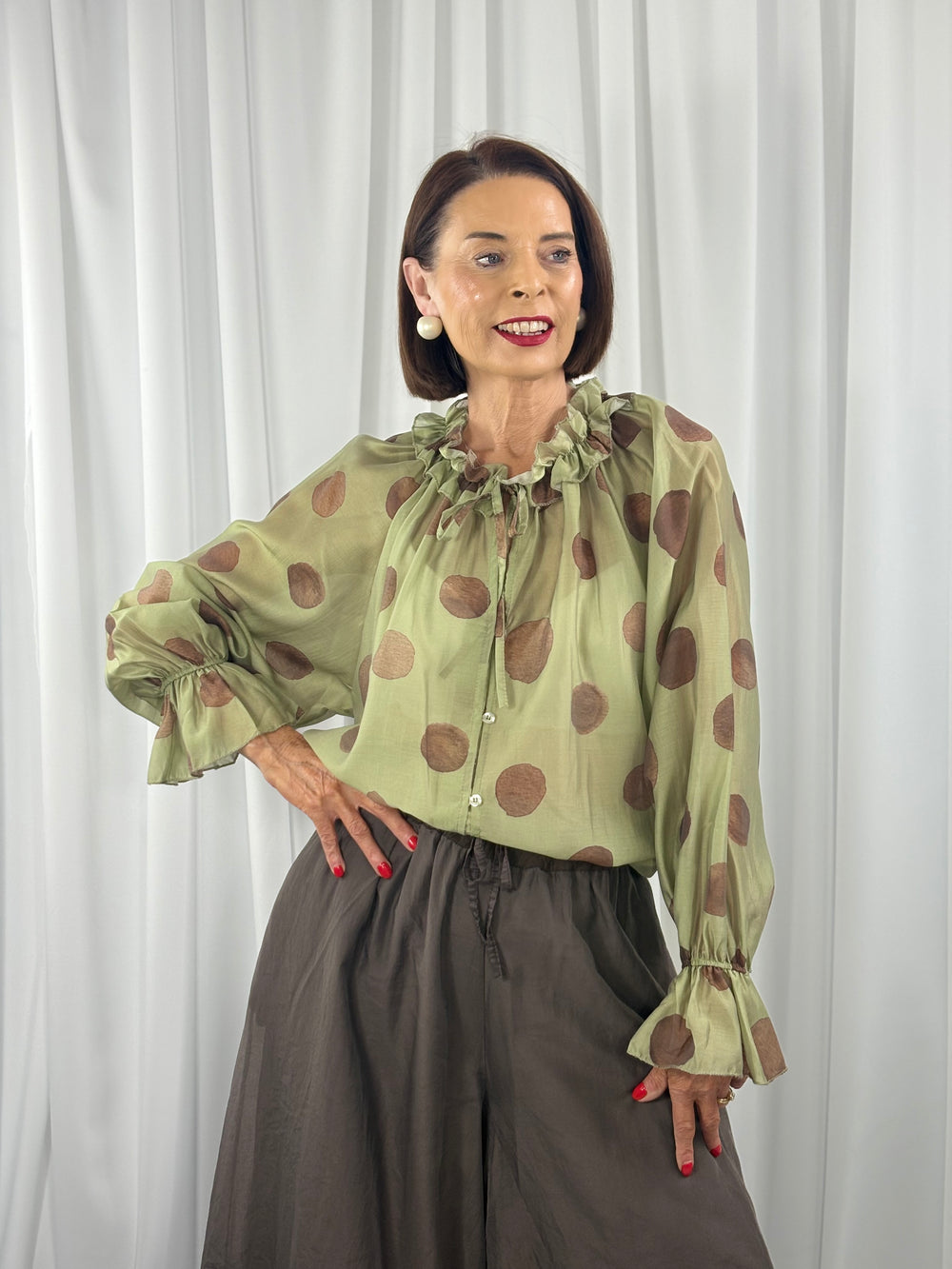 Alfredo top in sage with chocolate spots
