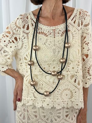 Roberto Crochet suit in cream