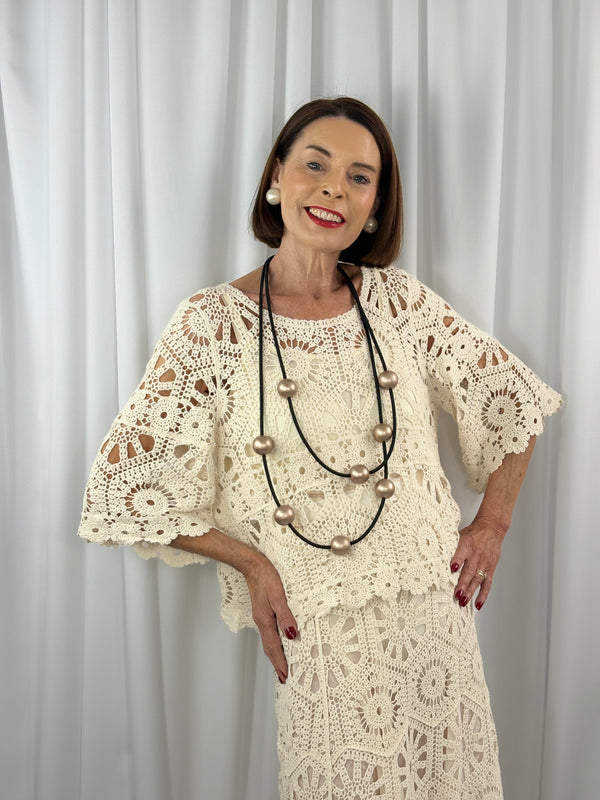 Roberto Crochet suit in cream