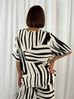 Catherine suit in black and cream