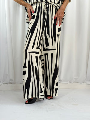 Catherine suit in black and cream