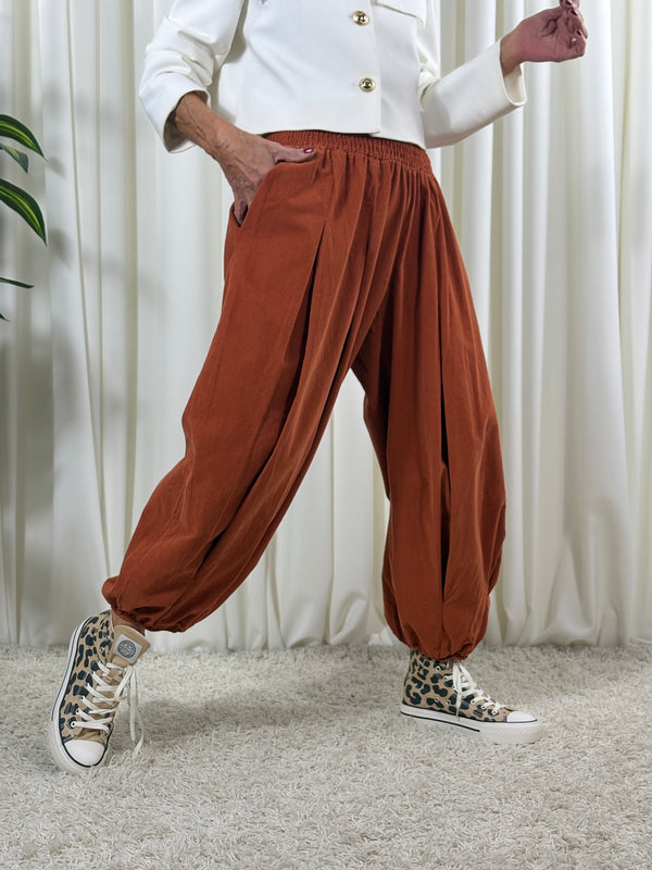 Sofia pin cord balloon trousers in rust