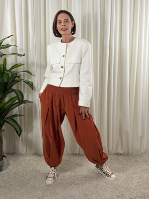 Sofia pin cord balloon trousers in rust