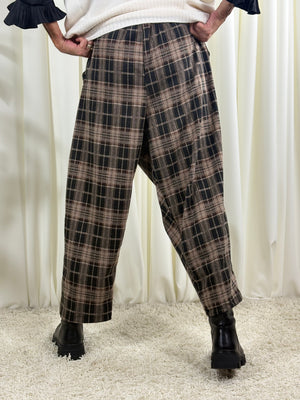 Rachel asymmetric trousers in black and beige