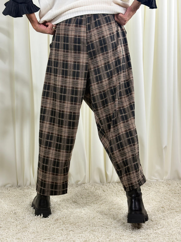 Rachel asymmetric trousers in black and beige