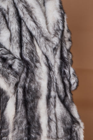 Calgary faux fur long coat in cream and black