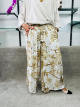 Ruby Woo Plazzo Trousers in Beige and white