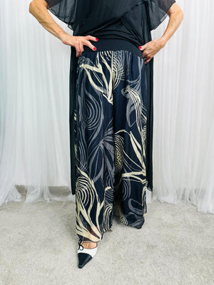 Flora Silky Plazzo Trousers in black and Beige