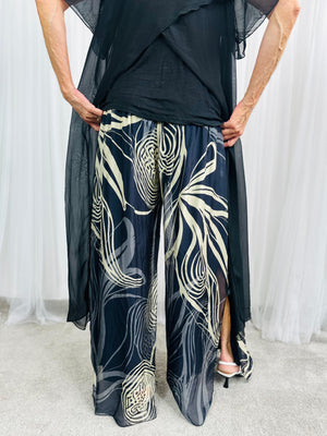 Flora Silky Plazzo Trousers in black and Beige