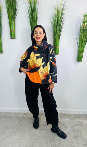 New york pulse asymetric jacket in black and orange