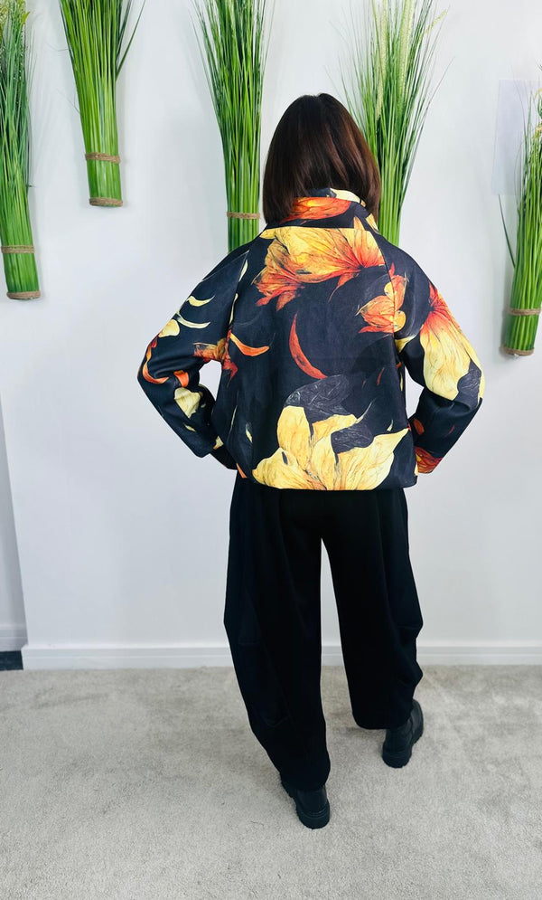 New york pulse asymetric jacket in black and orange