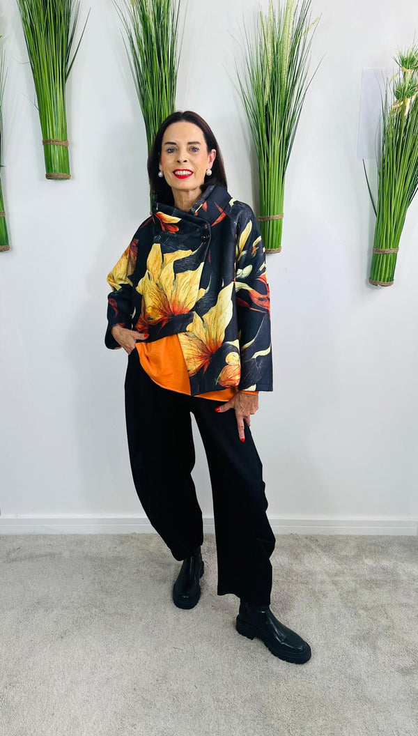 New york pulse asymetric jacket in black and orange