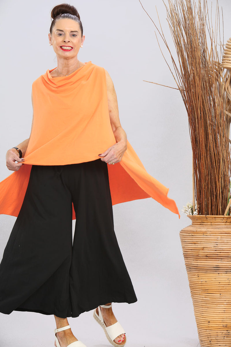 Raffi top over layering in coral