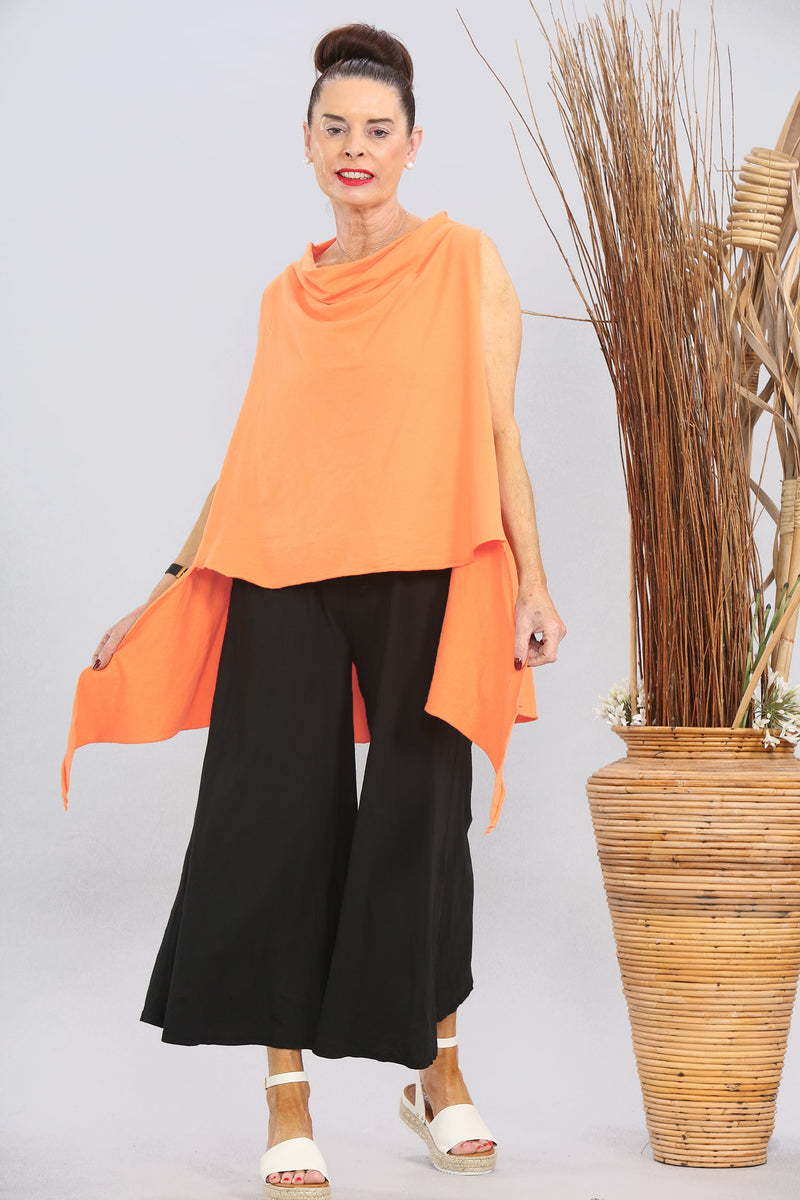 Raffi top over layering in coral