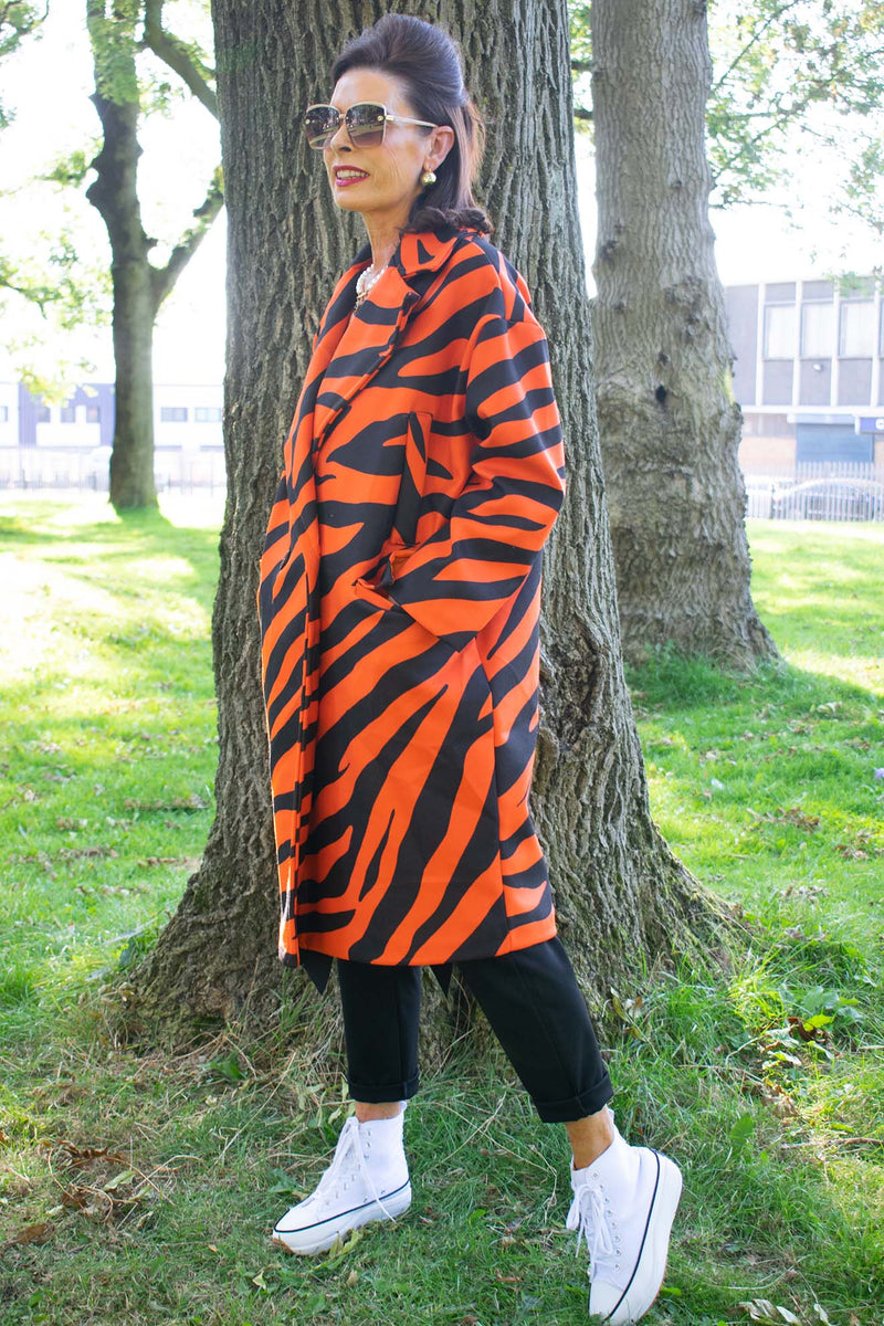 Elegant Holland Park Coat in Orange Animal Print